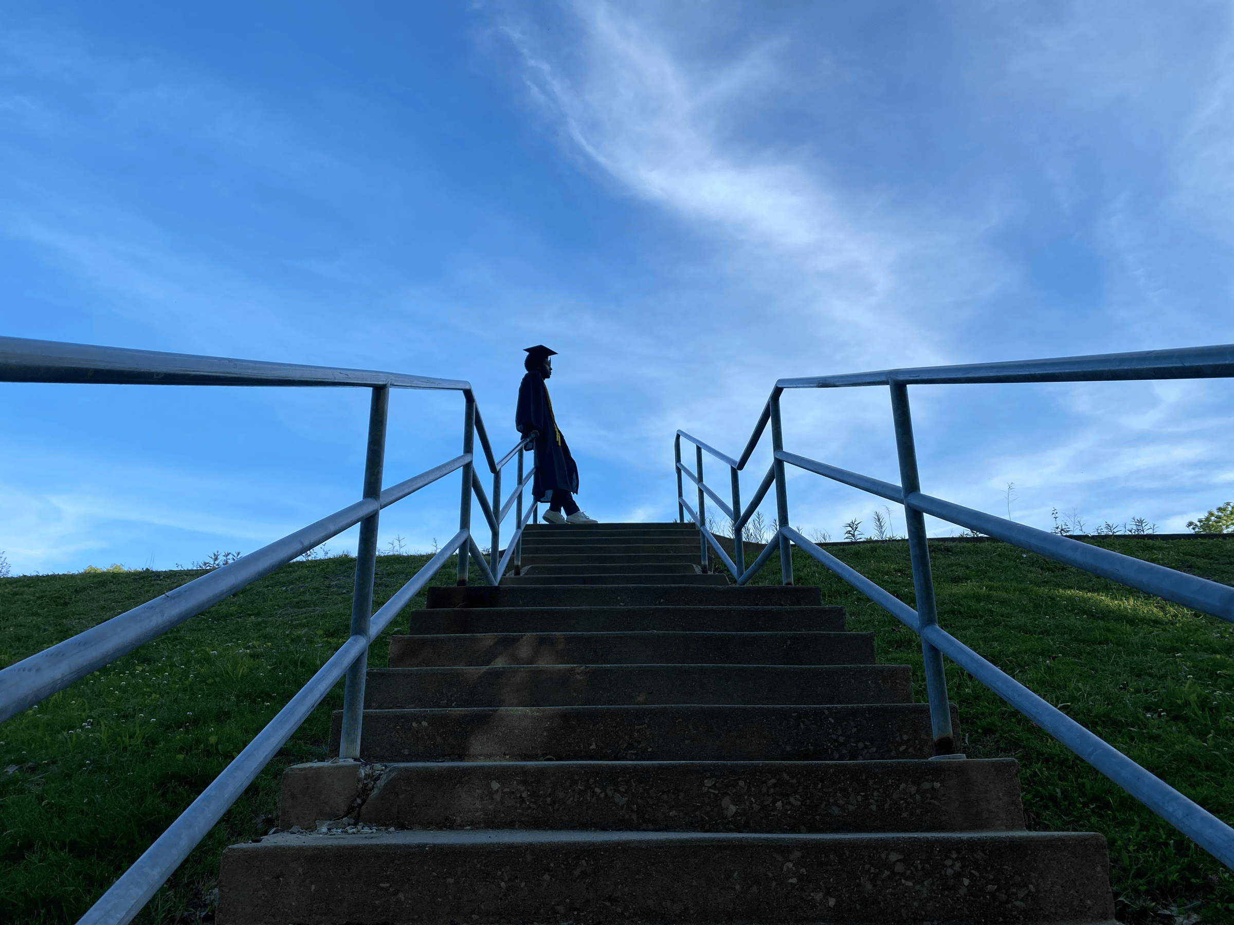 Me at the top of the staircase between Blumberg Hall and the Apartments East/West dormitories.